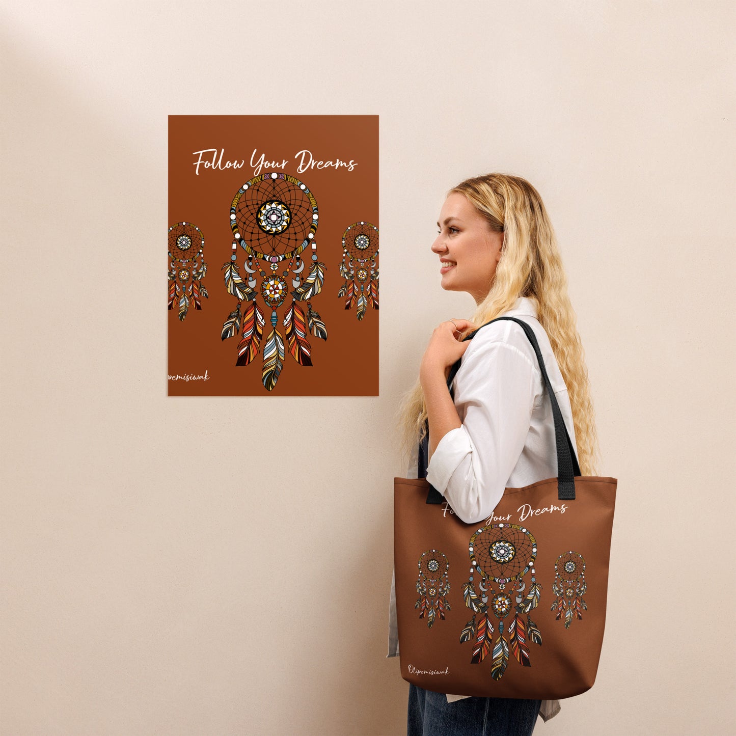 Woman holding a brown tote bag with dreamcatcher design and 'Follow Your Dreams' Canadian Indigenous Art