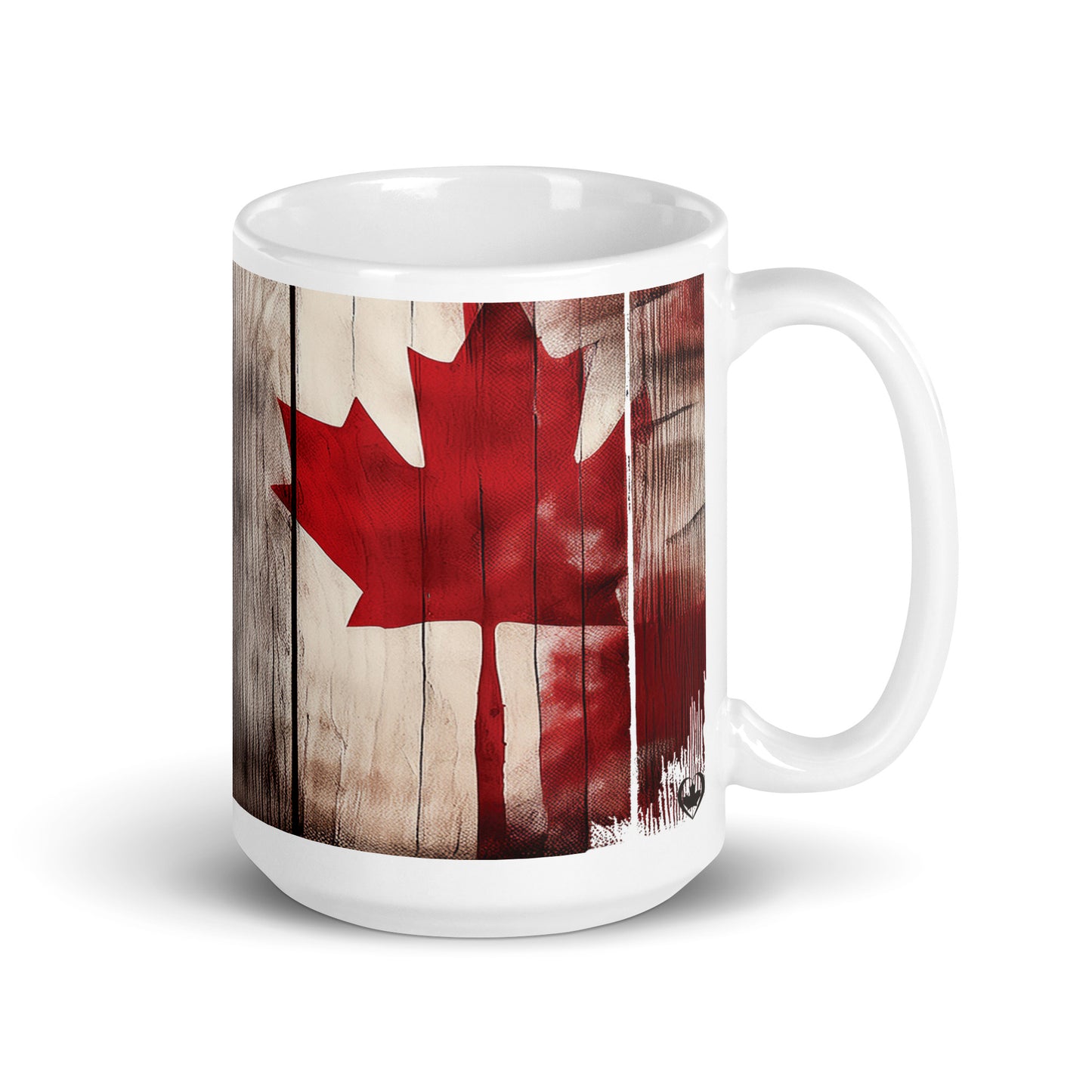 White mug with a red maple leaf design on a wooden background